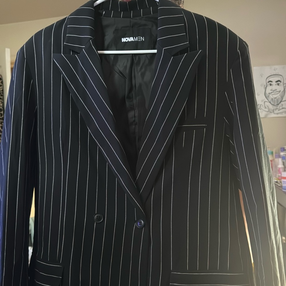 Black and white striped blazer.